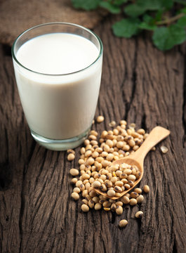 Soy milk with beans on wood
