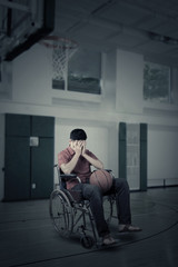Fototapeta na wymiar Injured player in the basketball arena