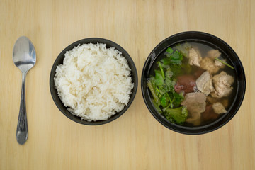 over view Pork soup made from pork bone with Ma-Li rice.break fast or diner Thai food 