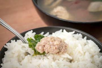 Close up Ma-Li rice with Minced pork by Pork soup made from pork bone and east herbs.