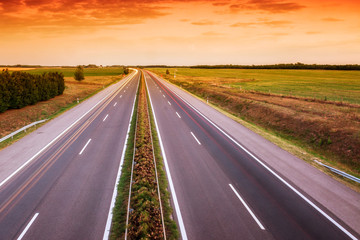 Cars speeding on a highway