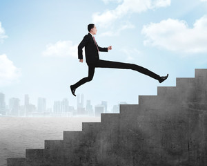 Long leg business person jump to the highest stair