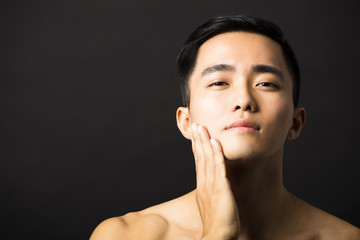 Closeup portrait of attractive young man face