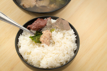 Pork soup made from pork bone with Ma-Li rice.breakfast or diner Thai food 