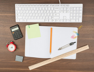 Alarm clock with office supplies