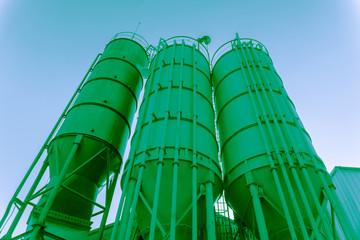 Green toned towers on a chemical factory