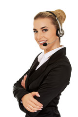 Happy young businesswoman with headset