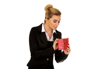 Happy smiling businesswoman with red wallet