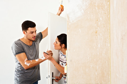 Couple Renovating The New Dwelling