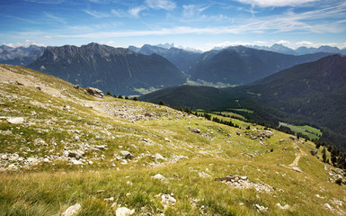 alpine meadow with panoramic view of the Dolomites