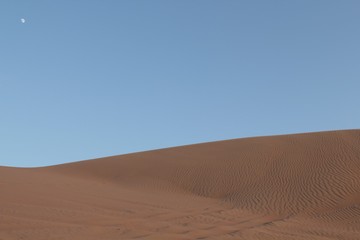 Fototapeta na wymiar Moonrise in Oman desert