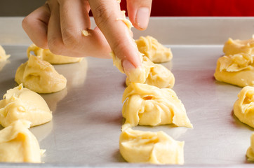 Making bakery,fresh cookies on baking tray ready to bake
