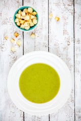 homemade cream soup with broccoli and croutons