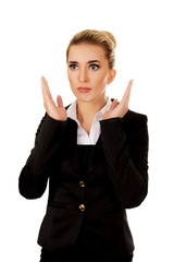 Obraz premium Shocked businesswoman grabs her face