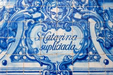 Porto, Portugal, October 22, 2012. Detail of Santa Catarina chapel in Porto the facades are completely covered tile panels in blue and white painted in 1929 by Eduardo Leite. - 93315040