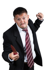 Angry businessman threaten with a knife