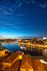 Porto city, Portugal October 17, 2013: city lights, panorama of Ribeira and Douro river in the...