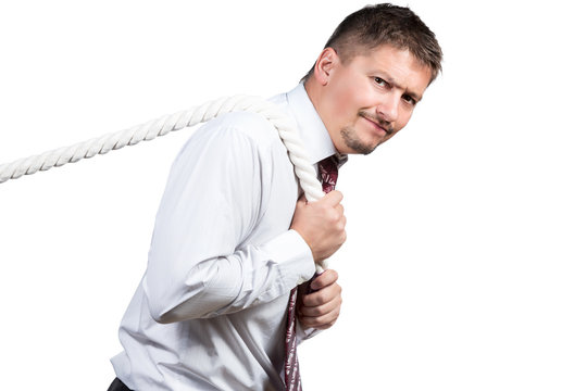 Businessman Pulling A Rope