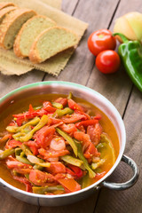 Hungarian traditional dish called Lecso, a vegetarian stew made of onion, pepper and tomato (Selective Focus, Focus in the middle of the dish)