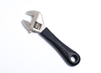 Crescent wrench on white background.