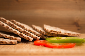 Crispbread and pepper slices closeup 