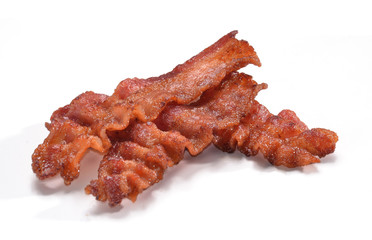 Frescas tocinetas recien fritas en fondo blanco.