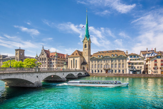 Z&uuml;rich city center with boat on river Limmat, Switzerland