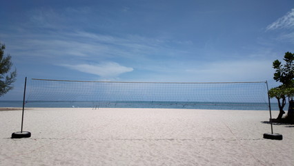 the beach volleyball and the blue sky
