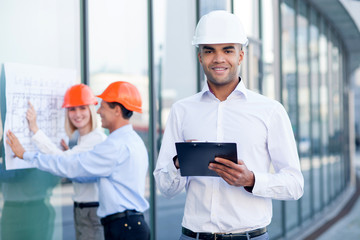 Skillful three builders are planning new project