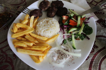 Meat balls with garnish Turkish national cuisine dish