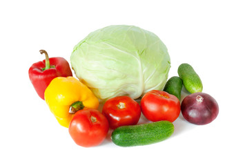 Composition with raw vegetables on white
