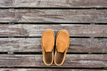 men's leather shoes on old wood background
