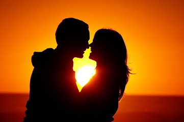 loving couple beach sunset