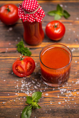 Obraz na płótnie Canvas Glass of tomato juice