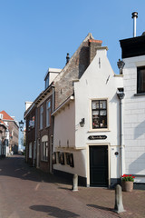 Streetscene with very small house in the city centre of Kampen, Overijssel, Netherlands