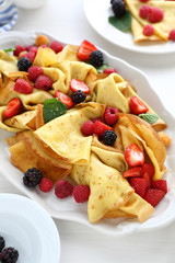 hot crepes with fresh berries