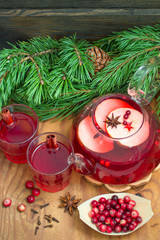 Hot cranberry drink with apples, cinnamon and star anise