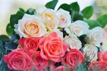 bouquet of roses on the grass close up