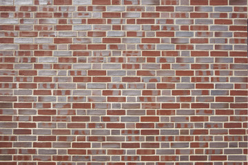 Hintergrundbild Backsteinmauer rot/violettgrau