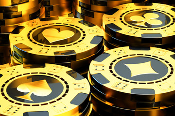 Gambling and casino concept, stack of golden poker chips close-up view