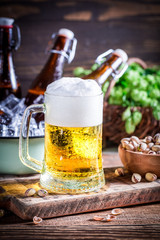 Cold and fresh beer with pistachios