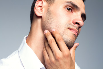 Portrait of handsome young man with clean face