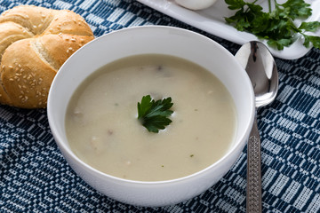 champignon soup in white bowl