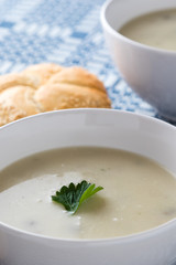 champignon soup in white bowl