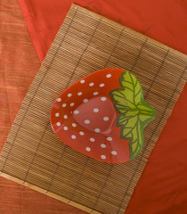 Children plate on a red background