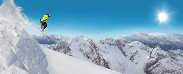 Jumping skier at jump