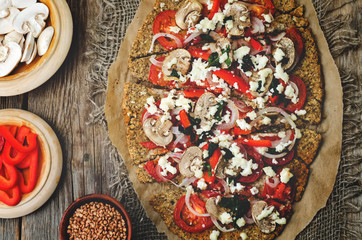 buckwheat Chia seed pizza crust with mushrooms, tomato, Basil an