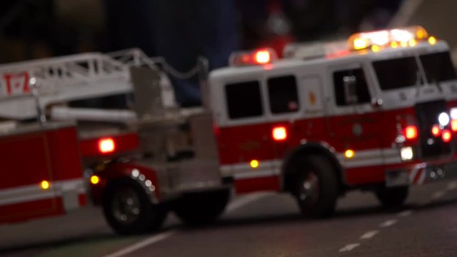 Fire trucks parked in a street background - unfocused style of the camera