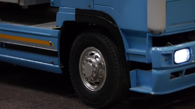 Truck tire wheels spin - closeup shot cameras - miniature car models
