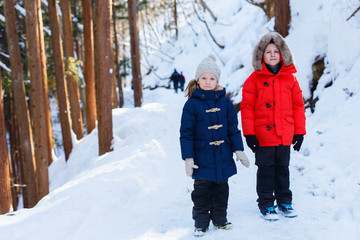 Fototapeta na wymiar Kids outdoors on winter